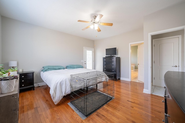 123 Carson Pl, Clinton, TN 37716 - bedroom featuring light wood-type flooring, baseboards, and ceiling fan