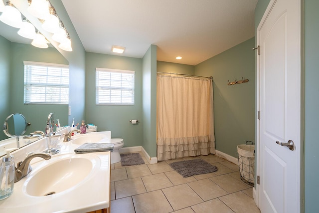 123 Carson Pl, Clinton, TN 37716 - full bathroom featuring toilet, baseboards, double vanity, tile patterned flooring, and recessed lighting