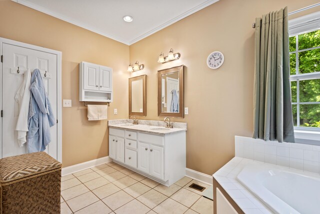 bathroom with visible vents, tile patterned flooring, baseboards, and a sink