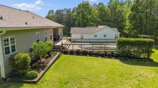 view of yard with a deck