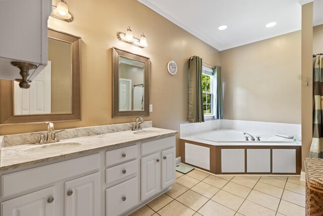 bathroom featuring double vanity, a bath, tile patterned floors, and a sink