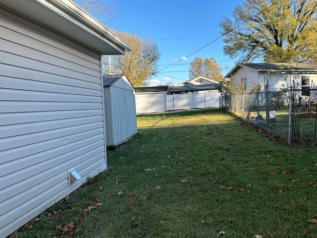 view of yard with a storage shed