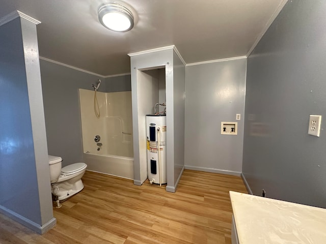 full bathroom featuring hardwood / wood-style floors, electric water heater, and crown molding