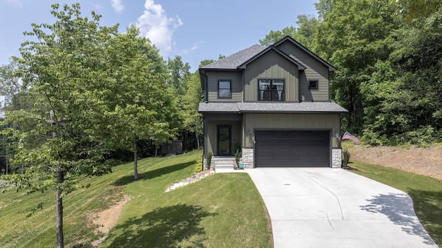 1282 No Pone Rd NW, Georgetown, TN 37336 - view of front of house with an attached garage, a front lawn, concrete driveway, a shingled roof, and stone siding