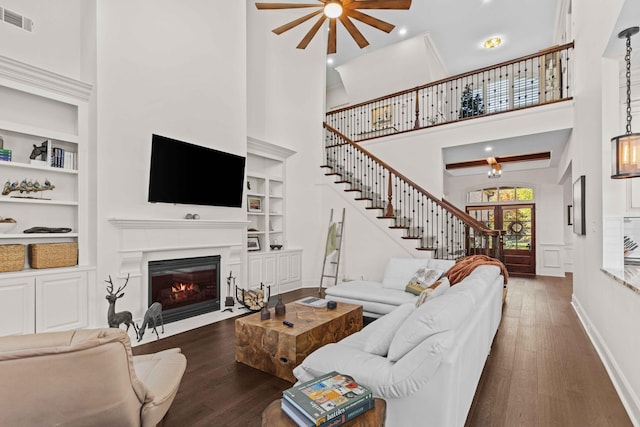 944 Ironwood Ln, Loudon, TN 37774 - living room with built in features, dark wood-type flooring, and a high ceiling