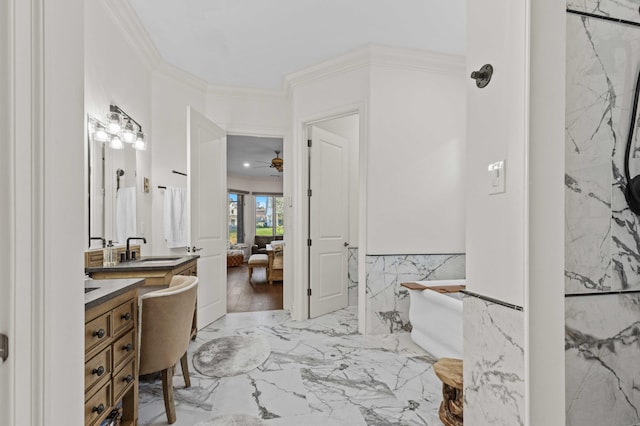 944 Ironwood Ln, Loudon, TN 37774 - bathroom with a bathing tub, vanity, tile walls, and ornamental molding