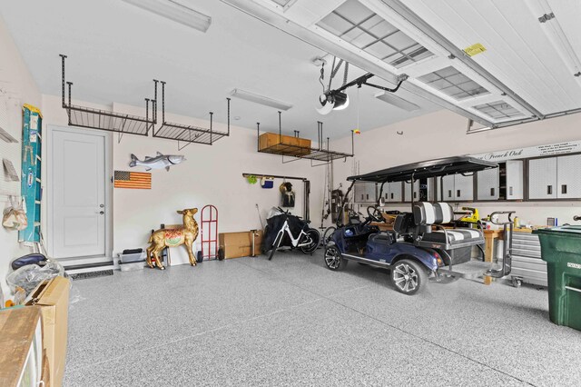 944 Ironwood Ln, Loudon, TN 37774 - garage featuring a garage door opener