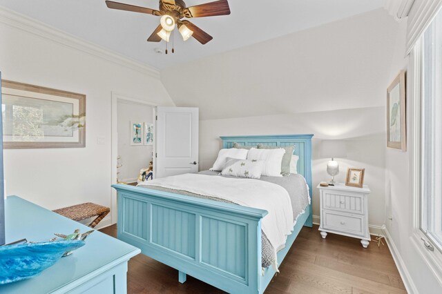 944 Ironwood Ln, Loudon, TN 37774 - bedroom featuring ceiling fan, dark hardwood / wood-style flooring, ornamental molding, and vaulted ceiling