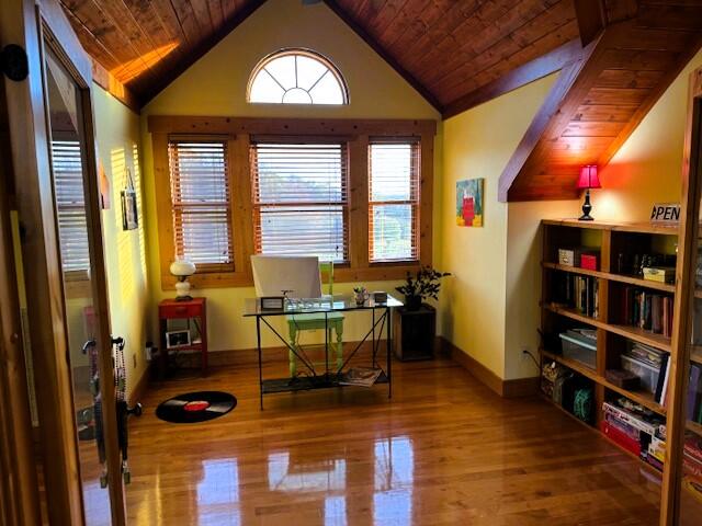 office with hardwood / wood-style flooring, lofted ceiling, and wood ceiling