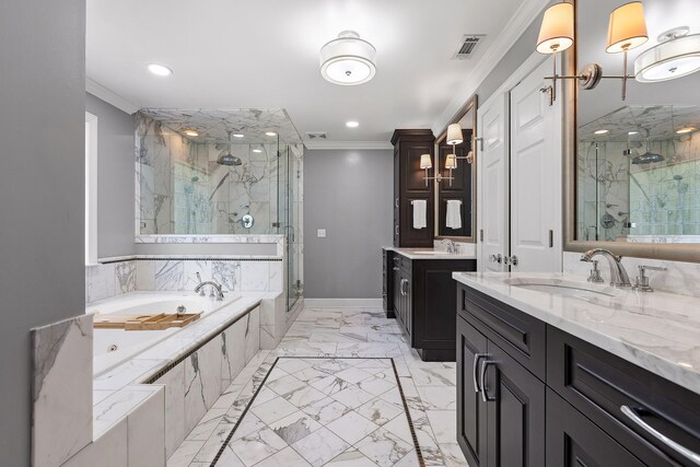 bathroom with vanity, ornamental molding, and shower with separate bathtub