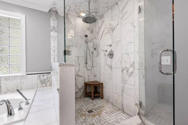 bathroom with tile patterned flooring, separate shower and tub, and tile walls