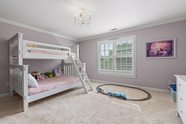 bedroom featuring carpet floors, ornamental molding, and a notable chandelier