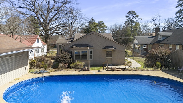 view of pool featuring fence and a fenced in pool