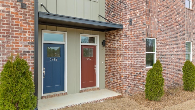 1942 Addi Ln, Chattanooga, TN 37421 - doorway to property with board and batten siding and brick siding