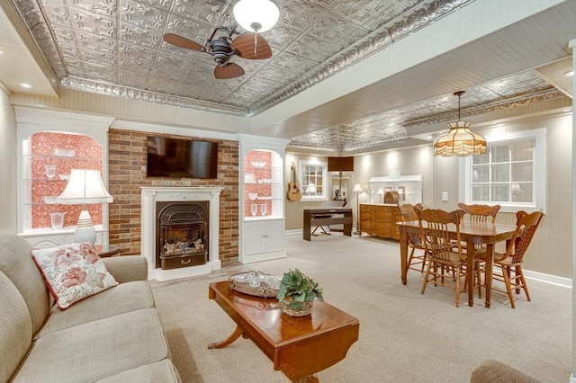 260 Sequoia Rd NW, Cleveland, TN 37312 - carpeted living area featuring an ornate ceiling, a fireplace, ceiling fan, and crown molding