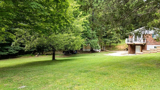 260 Sequoia Rd NW, Cleveland, TN 37312 - view of green lawn with a deck