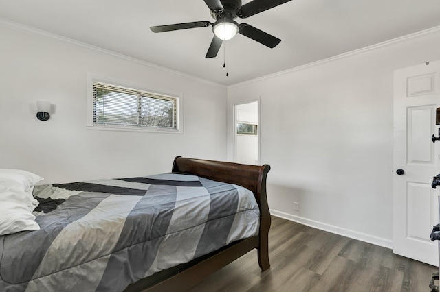 bedroom with ceiling fan, ornamental molding, and dark hardwood / wood-style floors