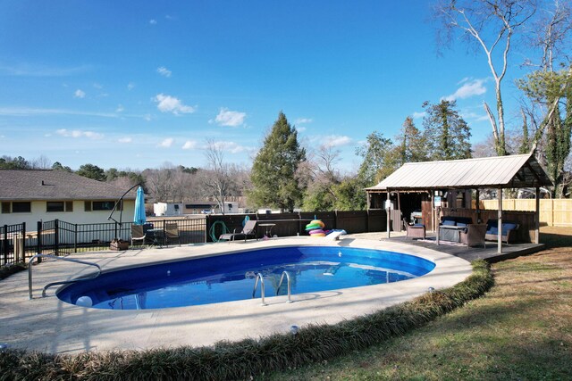 view of swimming pool with a gazebo