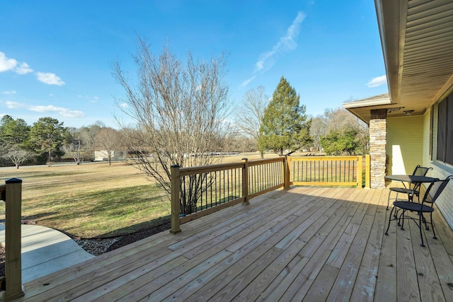 deck featuring a yard