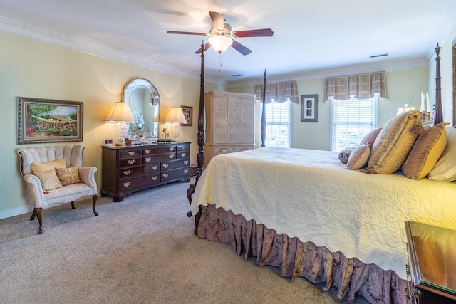 carpeted bedroom featuring crown molding and ceiling fan