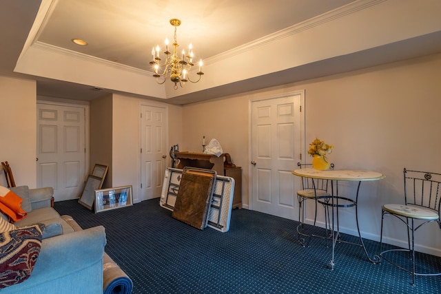 living area with a chandelier, dark carpet, a raised ceiling, and ornamental molding