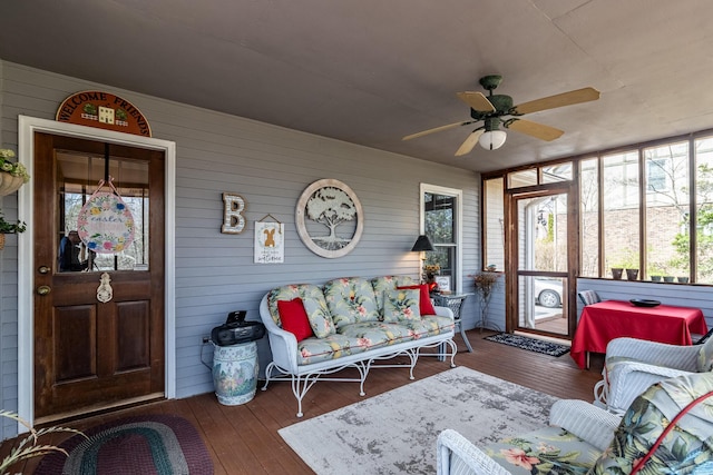 sunroom with ceiling fan