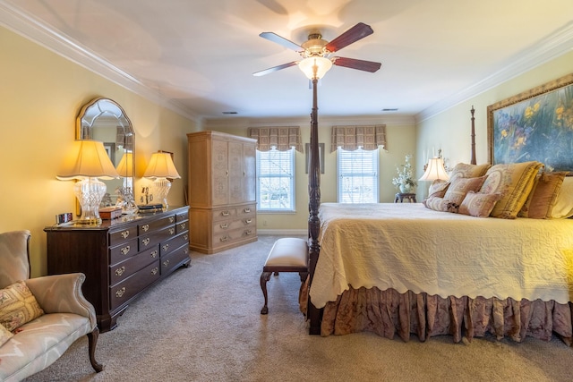bedroom featuring carpet flooring, crown molding, and ceiling fan