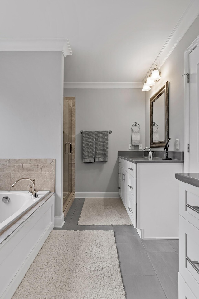 bathroom with vanity, separate shower and tub, and crown molding