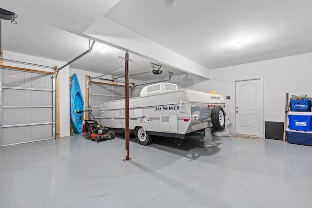 garage featuring a garage door opener