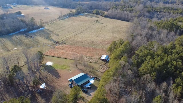 birds eye view of property featuring a rural view