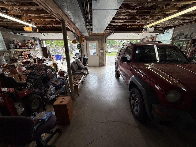 2510 Burning Tree Dr NW, Cleveland, TN 37312 - garage featuring a garage door opener
