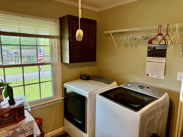 2510 Burning Tree Dr NW, Cleveland, TN 37312 - laundry area featuring baseboards, cabinet space, crown molding, and washing machine and dryer