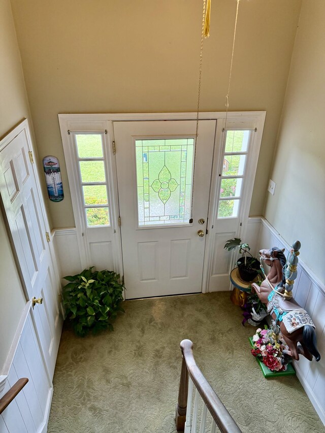 2510 Burning Tree Dr NW, Cleveland, TN 37312 - carpeted foyer with a decorative wall, a high ceiling, and wainscoting
