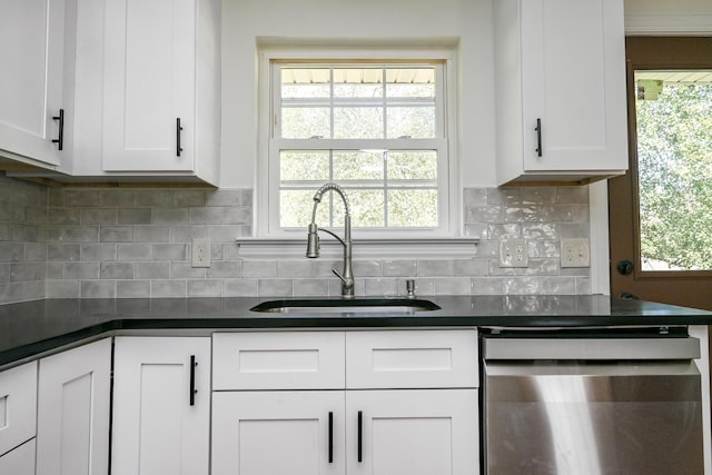 kitchen with sink, white cabinets, dishwasher, backsplash, and a healthy amount of sunlight