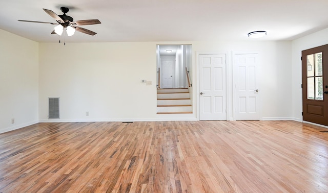 unfurnished room featuring ceiling fan and light hardwood / wood-style floors