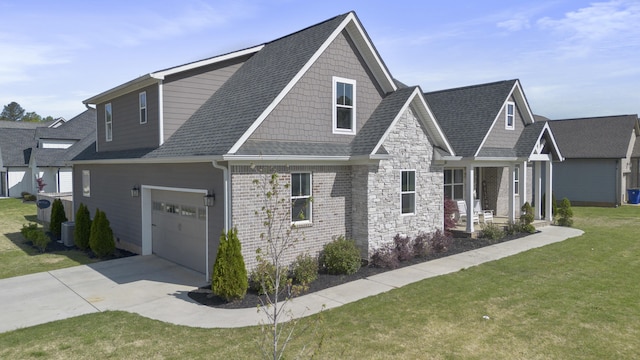 view of front facade with concrete driveway, a front lawn, stone siding, a shingled roof, and a garage