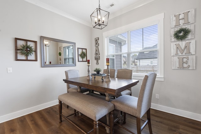 dining area with visible vents, baseboards, a notable chandelier, and dark wood finished floors