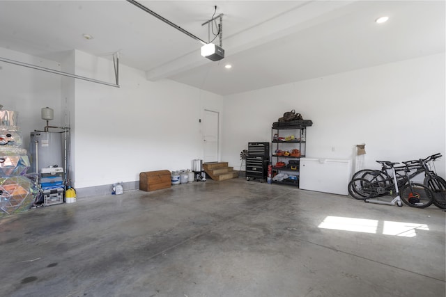 garage with recessed lighting, gas water heater, and a garage door opener