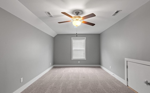 264 Courtland Crest Dr SW, Cleveland, TN 37311 - empty room with a ceiling fan, light colored carpet, and vaulted ceiling