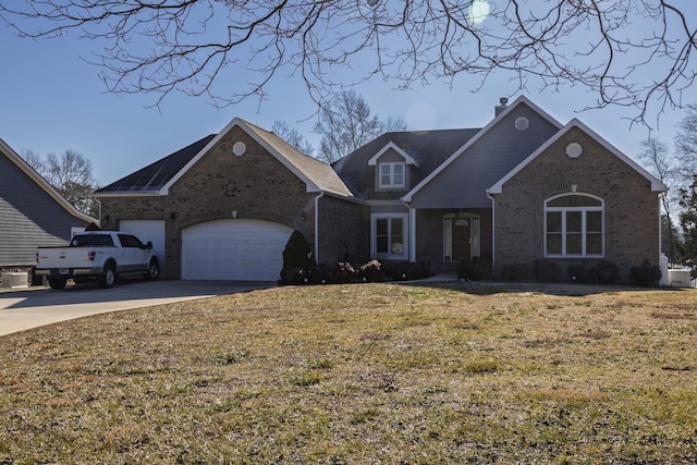 view of front property featuring a garage, central air condition unit, and a front lawn