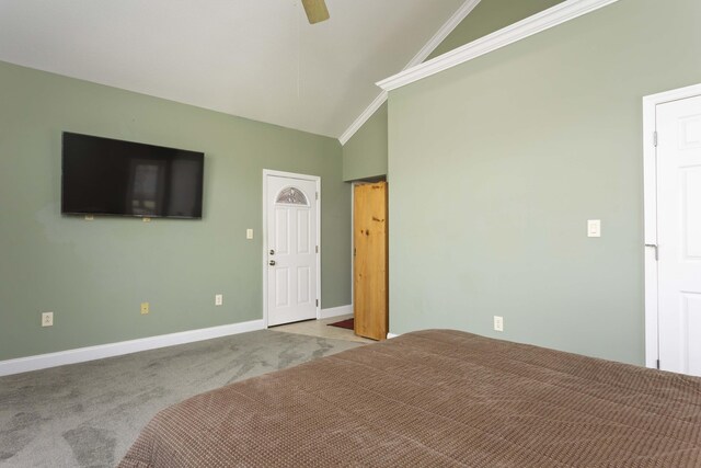 unfurnished bedroom with ceiling fan, light colored carpet, and high vaulted ceiling