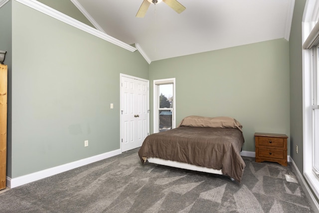 carpeted bedroom featuring crown molding, ceiling fan, and lofted ceiling