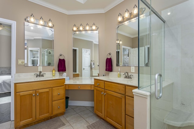 bathroom with vanity, crown molding, tile patterned floors, and walk in shower