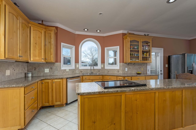 kitchen featuring sink, decorative backsplash, light tile patterned floors, stainless steel appliances, and light stone countertops