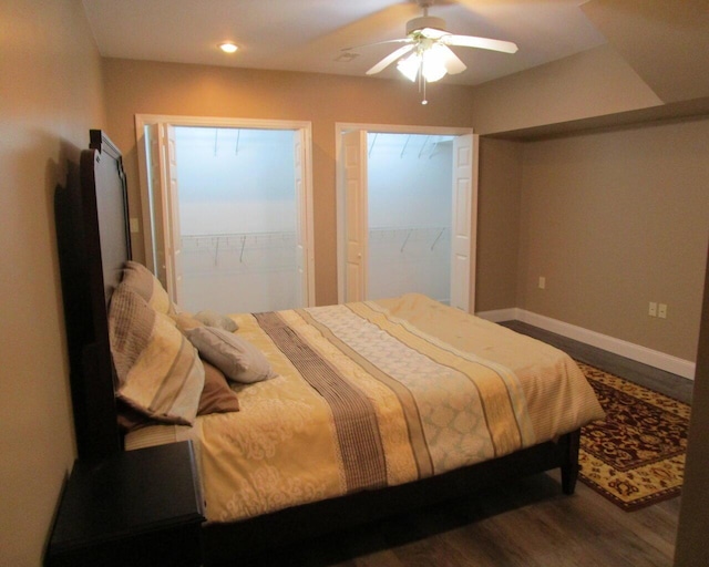 bedroom featuring dark wood-type flooring and ceiling fan