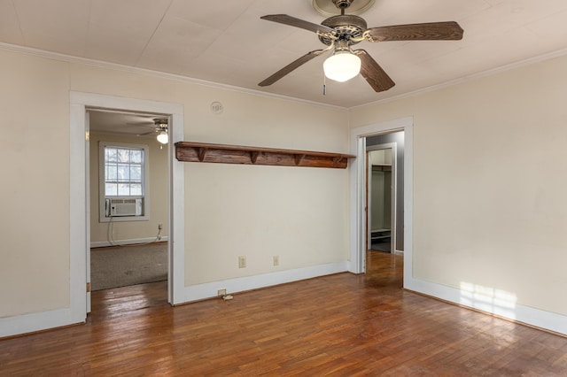 spare room with ceiling fan, wood-type flooring, crown molding, and cooling unit