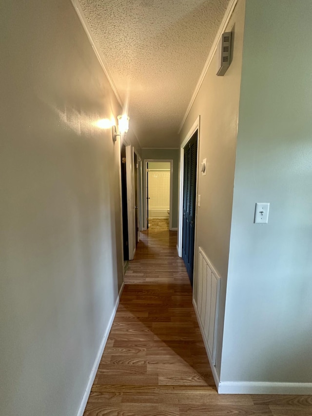 175 Sunset Estates Ln, Dayton, TN 37321 - hall with crown molding, a textured ceiling, wood finished floors, and baseboards