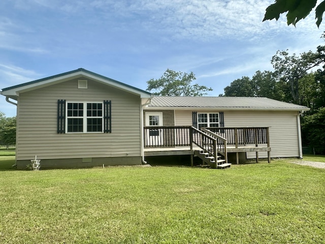 175 Sunset Estates Ln, Dayton, TN 37321 - rear view of house with a yard, a wooden deck, and metal roof