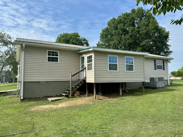 175 Sunset Estates Ln, Dayton, TN 37321 - back of house featuring metal roof, a yard, stairs, crawl space, and central air condition unit