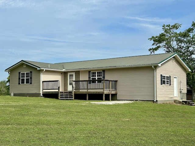 175 Sunset Estates Ln, Dayton, TN 37321 - rear view of house featuring a lawn, a deck, and metal roof